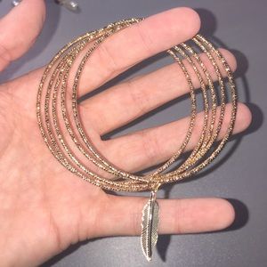 5 PIECE BRACELET SET WITH FEATHER CHARM!